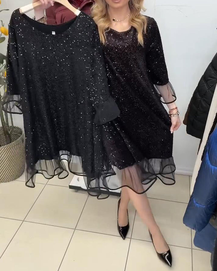 Modern Dress with Standout Sleeves and Sequins