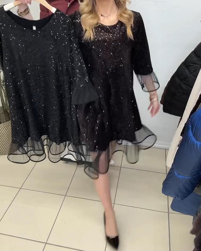 Modern Dress with Standout Sleeves and Sequins