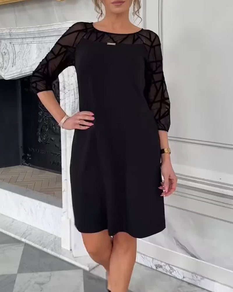 Elegant Dress with Round Neckline and Modern Design