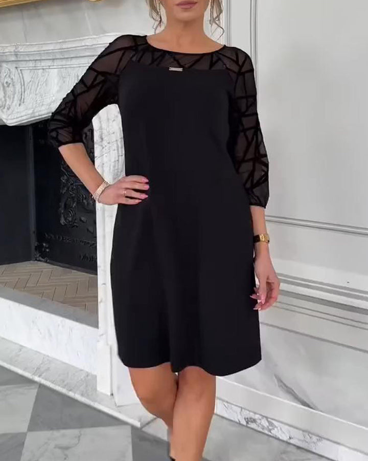 Elegant Dress with Round Neckline and Modern Design