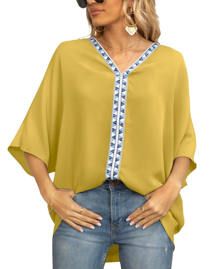 Avani | Comfortable And Warm geometric trim oversized tunic top